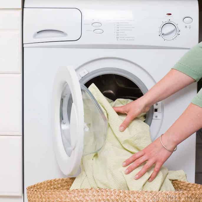 removing clothes from dryer