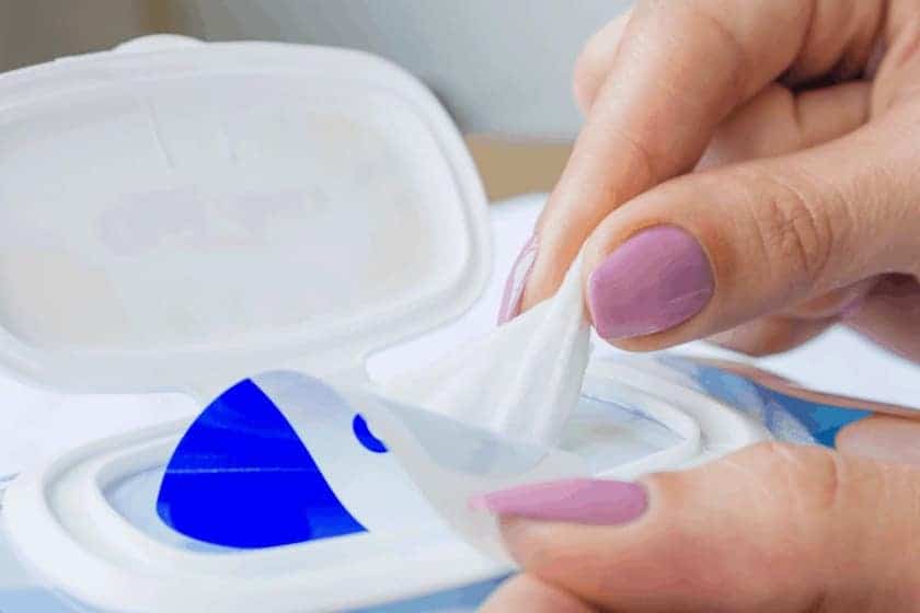removing baby wipe from container