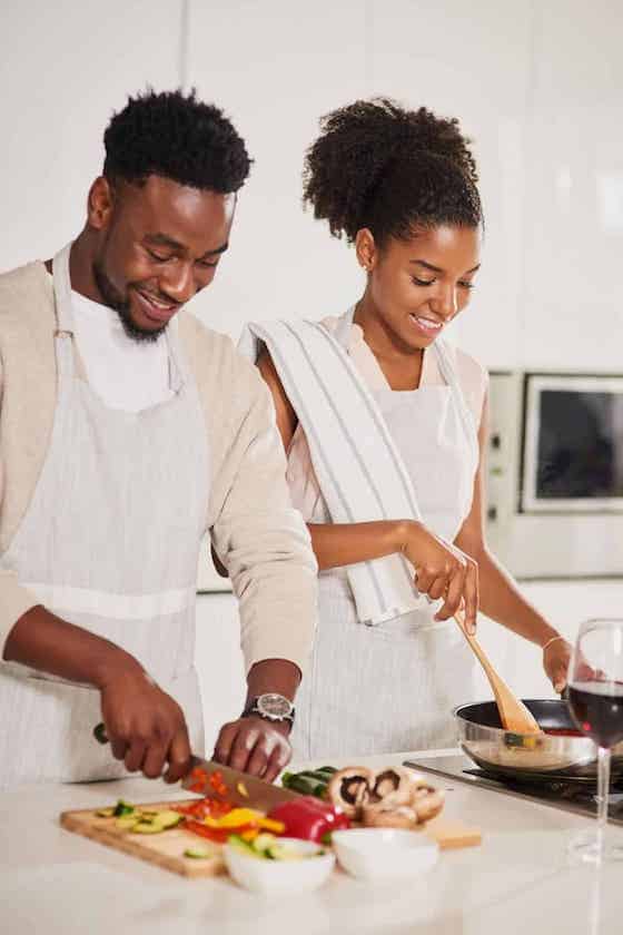 couple cooking together.