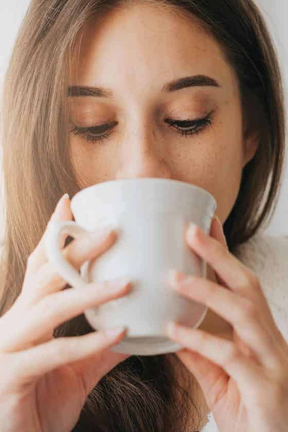 woman sipping tea