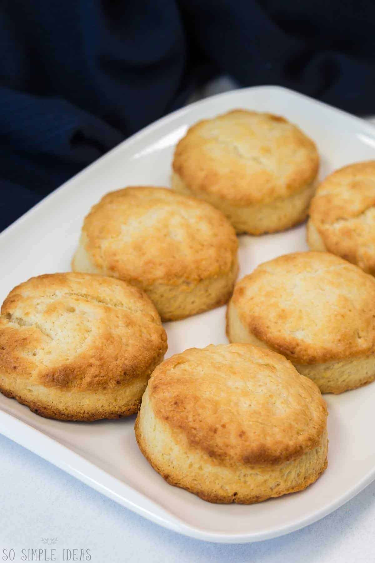 biscuits on white platter.