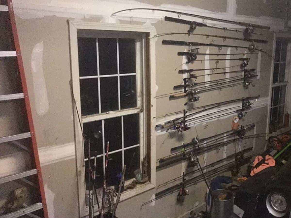 fishing poles on wall hooks.