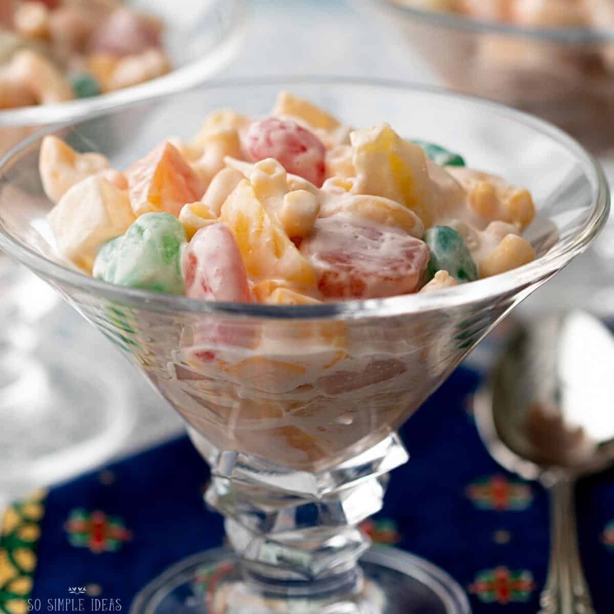 macaroni fruit salad in glass dessert dishes.