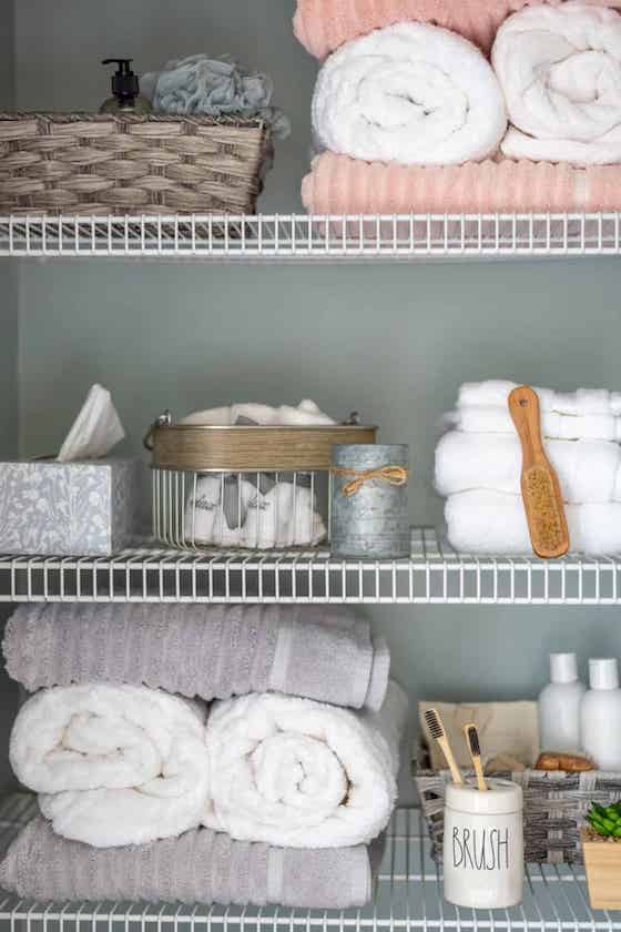 bathroom items organized in closet.