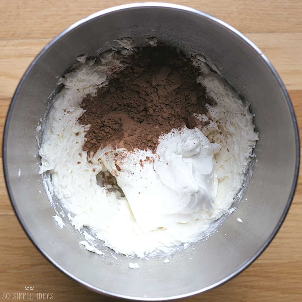 cocoa and sour cream added to sweetened cream cheese.