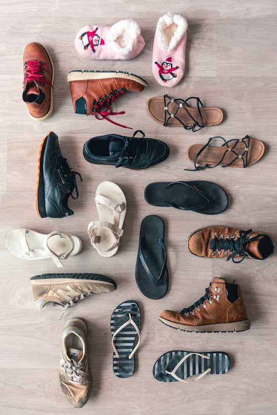 assorted pairs of shoes on the floor.