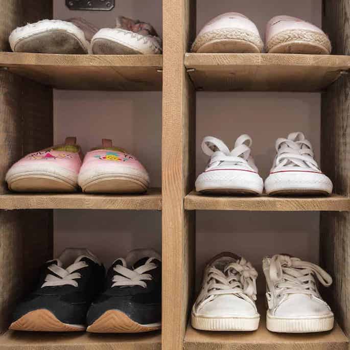 decluttered shoes stored in cubbies.