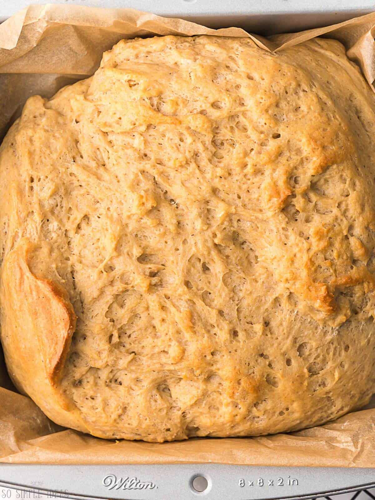 carbquik bread in parchment paper lined pan.