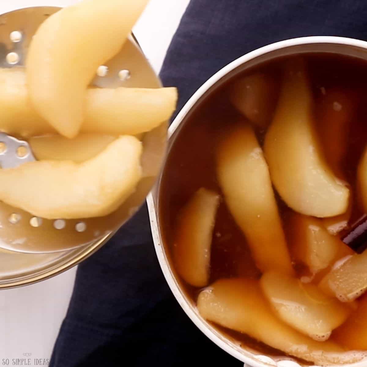 removing stewed pears with slotted spoon.