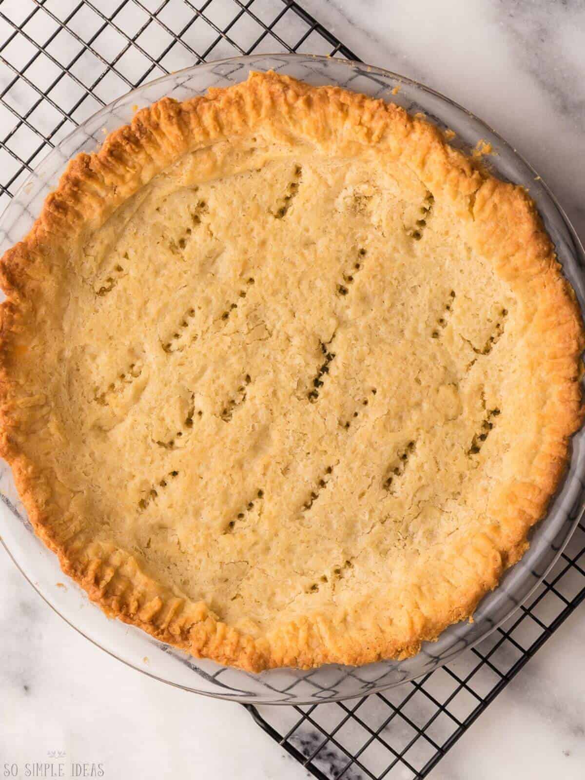 carbquik pie crust cooling on rack.