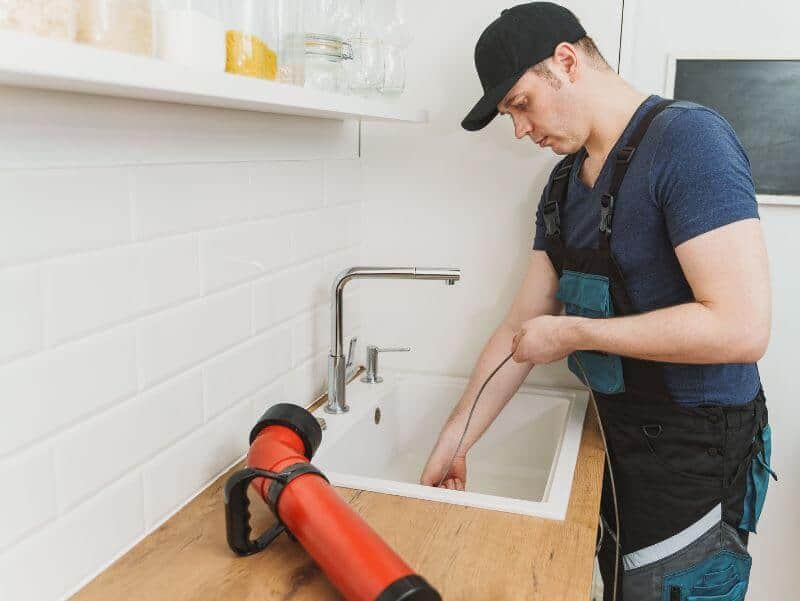 using a snake on sink drain.