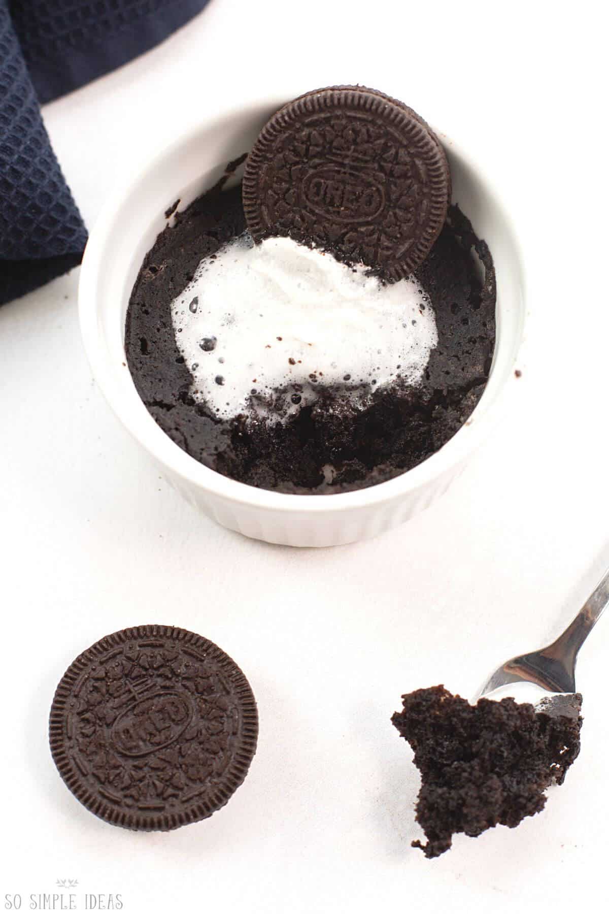 3 ingredient oreo mug cake with fork bite.