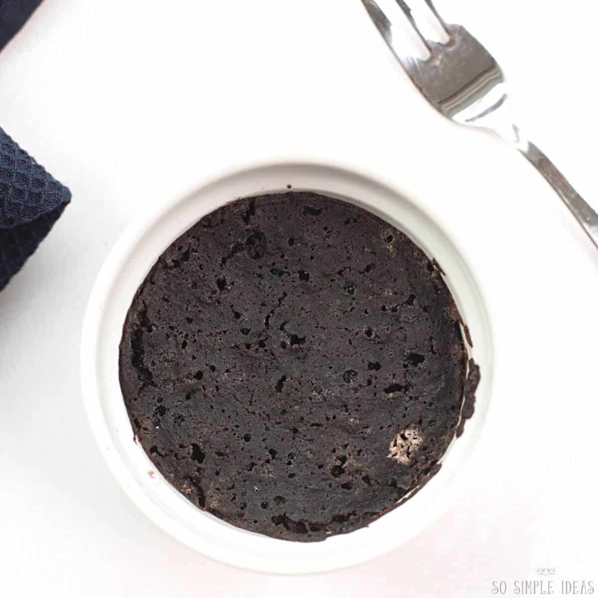 cooked mug cake in ramekin.