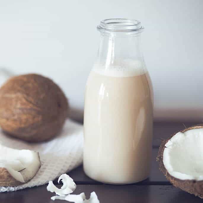fresh coconut milk in bottle.