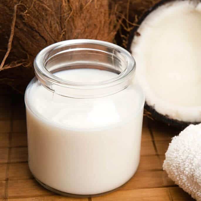 thickened coconut milk in jar.